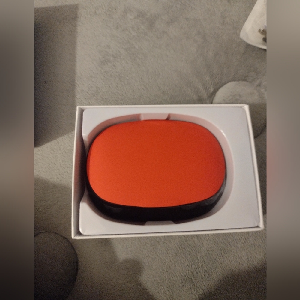 Red And Black Earbud Headphones.